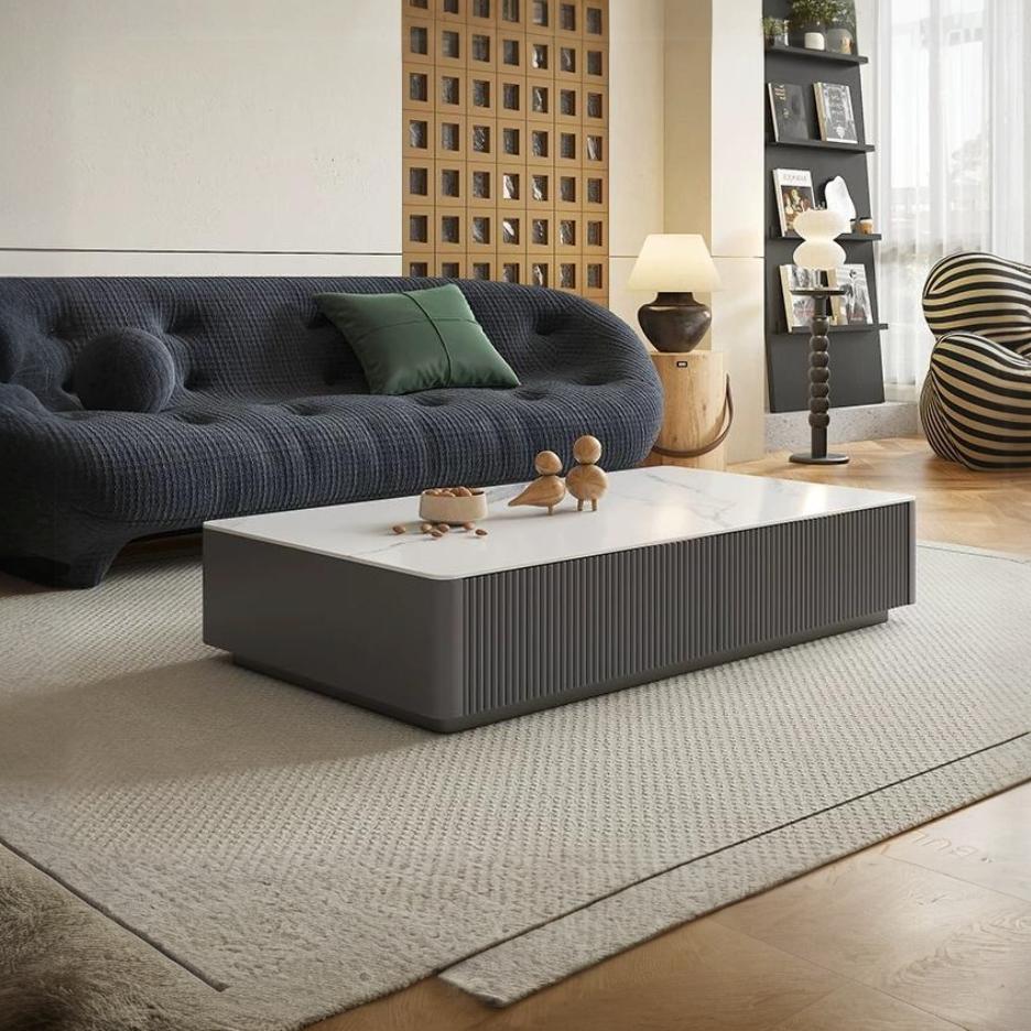 Modern rectangular coffee table with sleek white marble top and dark gray ribbed sides for abigail stylish tv stand sintered stone cream