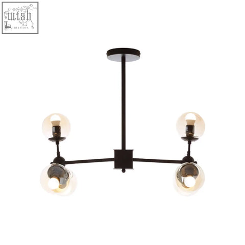 Matte black pendant light with six arms and four spherical glass globe shades in a sleek black metal design