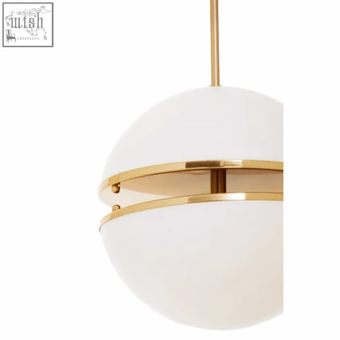 Abira brushed brass pendant light with frosted white glass shade and elegant gold-toned metal bands brass pendant light