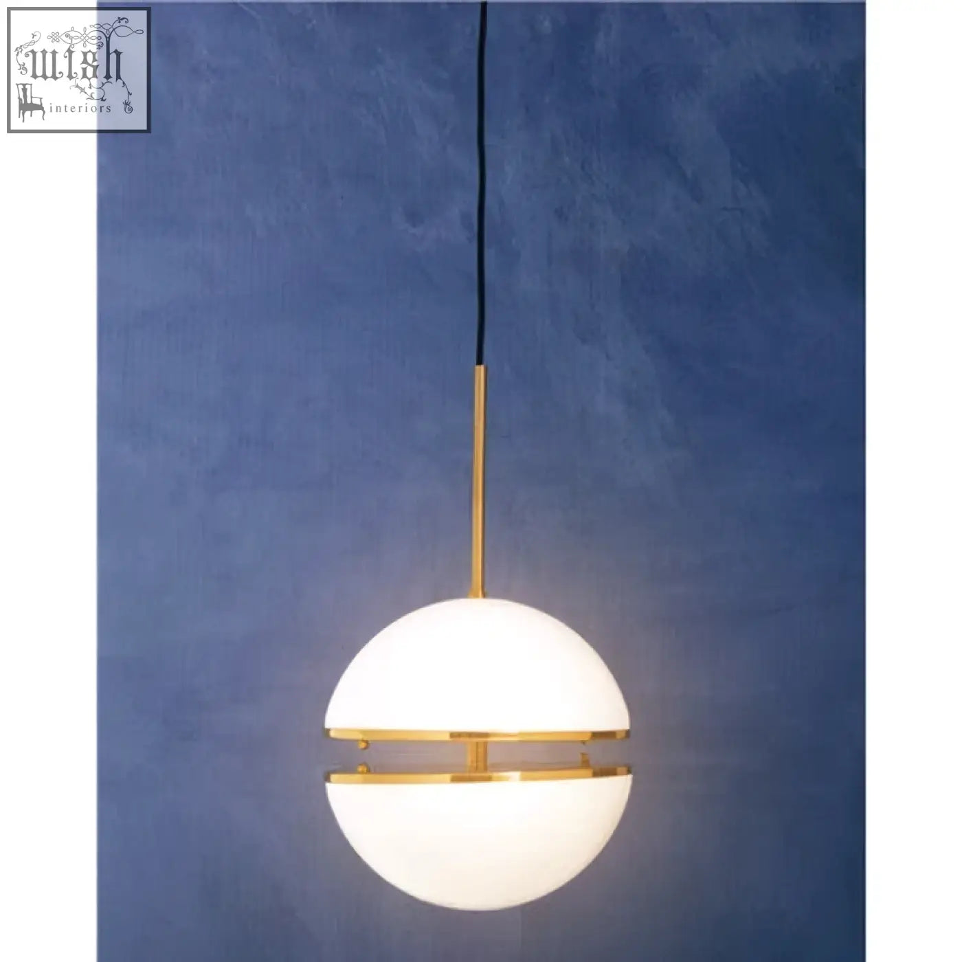 Abira brushed brass pendant light with a sleek frosted white glass globe and polished brass bands for stylish lighting