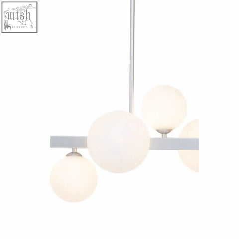 Modern minimalist abira chrome pendant lamp with sleek silver metal frame and five frosted glass globe bulbs