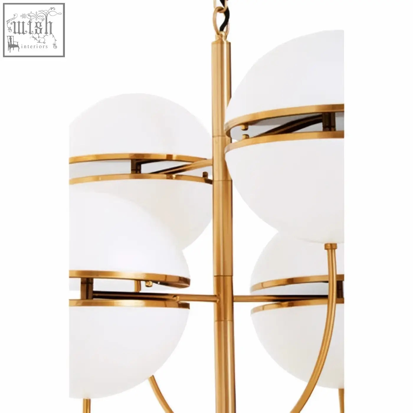 Gold-toned four ball brass pendant light with frosted white glass shades in a modern tiered design