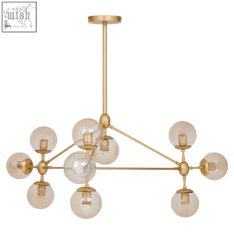 Abira gold 10 arm pendant light with gold tones and spherical glass bulbs in a modern geometric arm pendant design