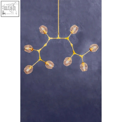Golden branch-style abira light gold pendant lamp with 8 arms and faceted amber glass orbs in light gold finish