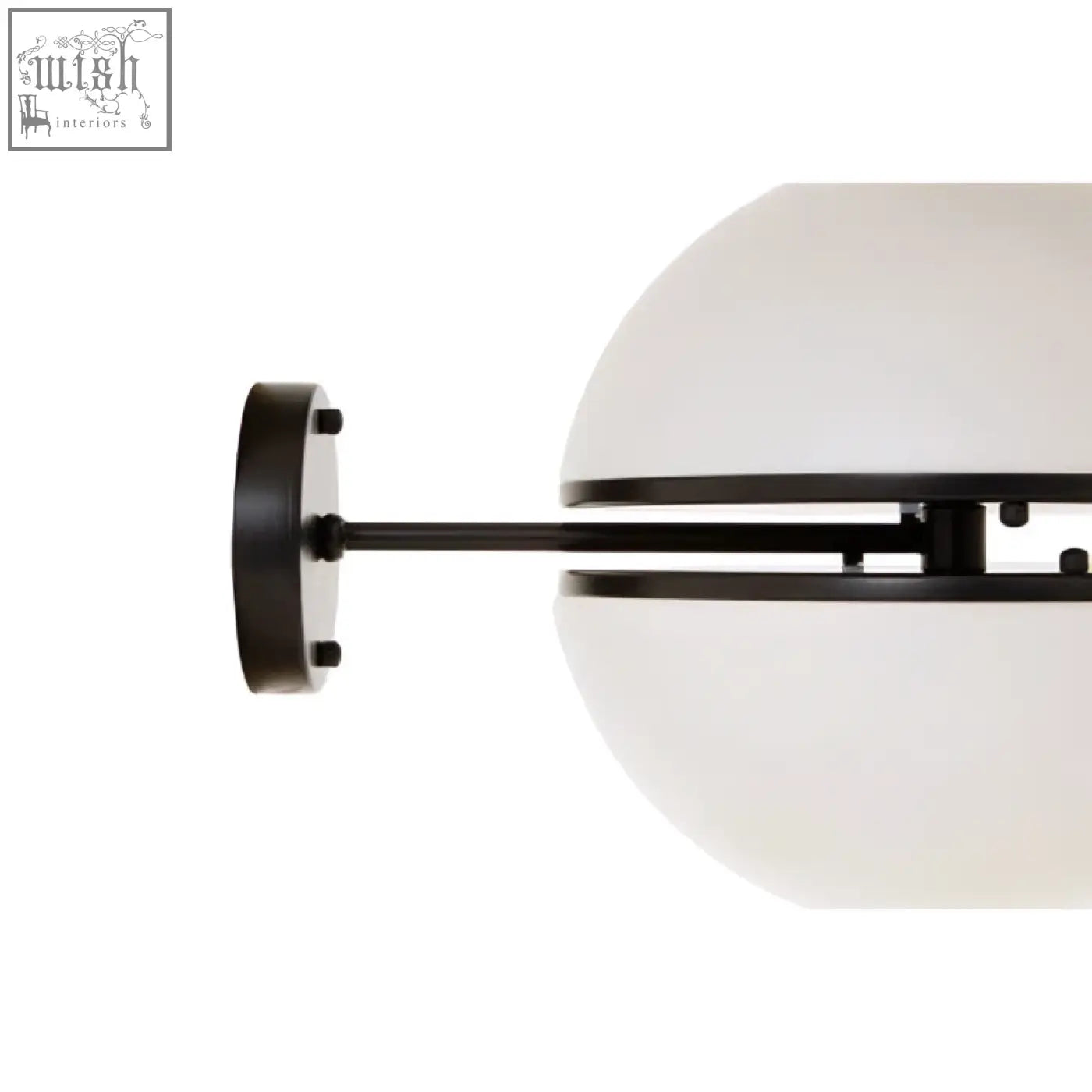 Black metal arm with matte finish supports off-white frosted glass globe in abira matt black ball wall light