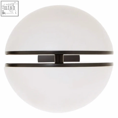 Abira matt black ball wall light with a sleek white glass sphere and minimalist black metal band accent