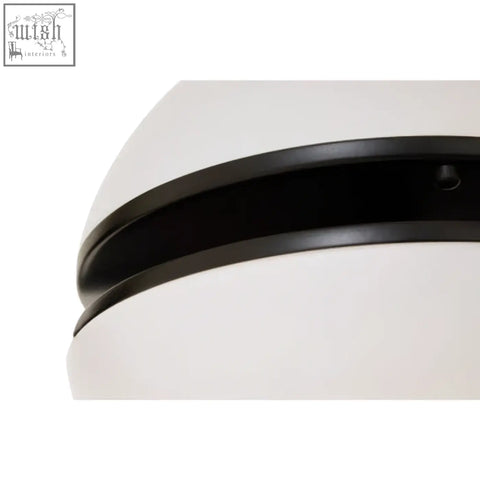 Abira matt black ball wall light with white oval ceiling fixture and sleek black trim for modern interiors