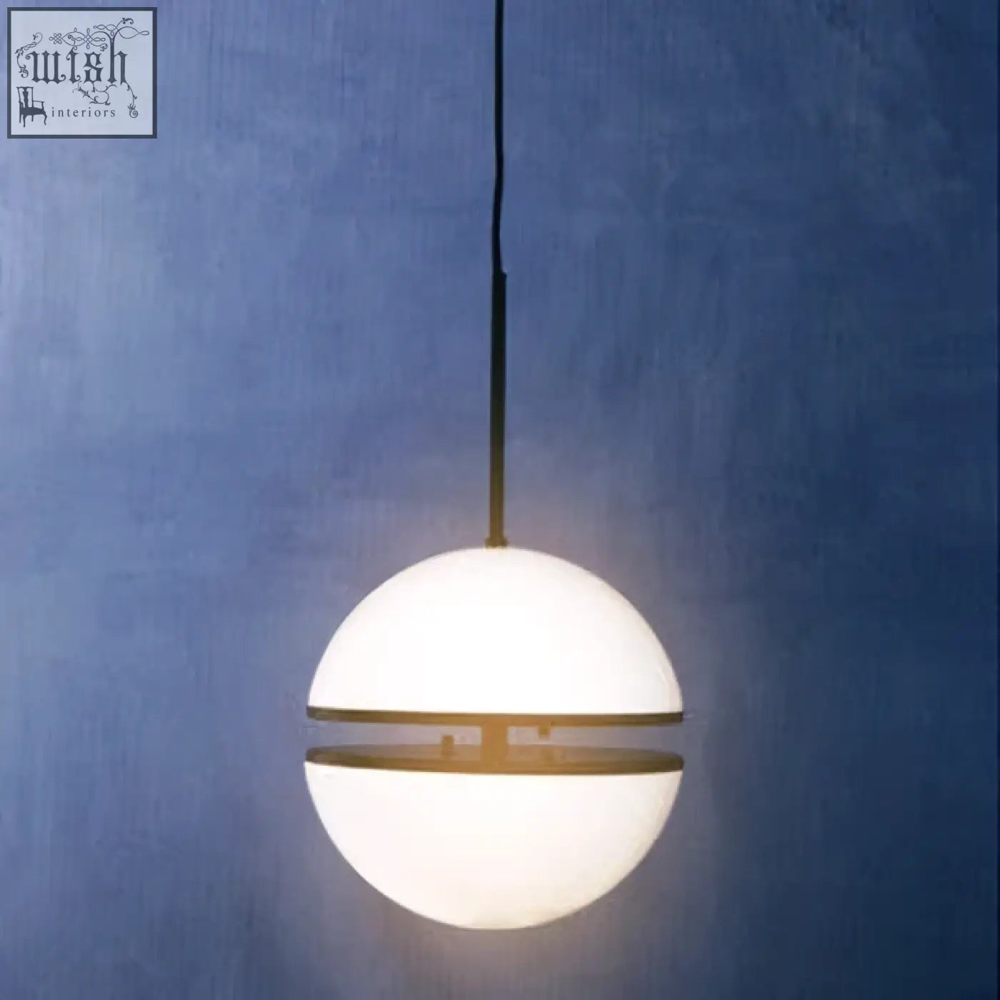 Abira matt black pendant light with a frosted white glass globe and gold metal bands in a sleek black pendant design