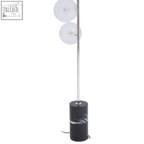 Abira nickel and black marble floor lamp with sleek chrome pole, two frosted glass globes, and black marble base