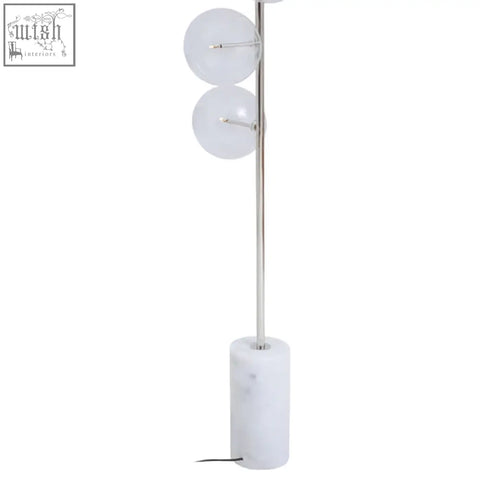 Modern abira nickel floor lamp with sleek chrome pole, two frosted glass shades, and a white marble base