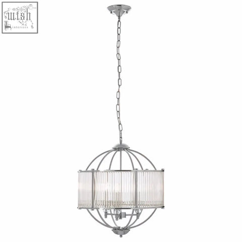 Chrome finished abira pendant light with spherical glass shade, vertical rods, and chain suspension for modern spaces