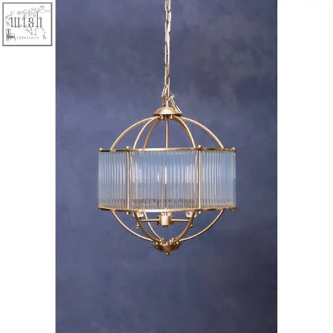 Gold-toned abira pendant light with cage-style design and vertical ribbed glass shade for stylish lighting