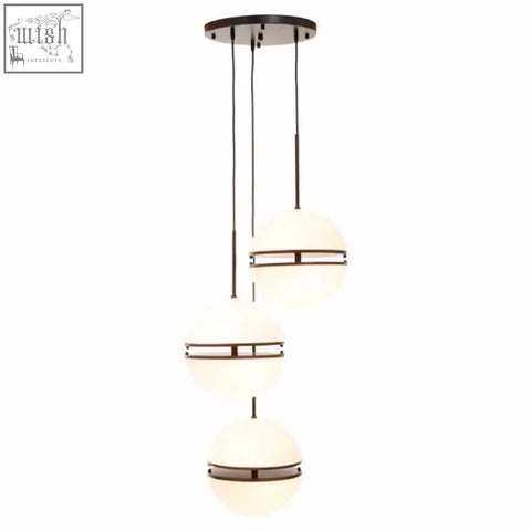 Modern three ball matt black pendant light with frosted glass spheres and dark metal accents for stylish lighting