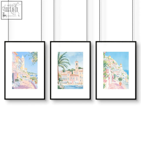 Three black-framed watercolor wall art prints with mediterranean coastal scenes perfect for bed wall decor sets