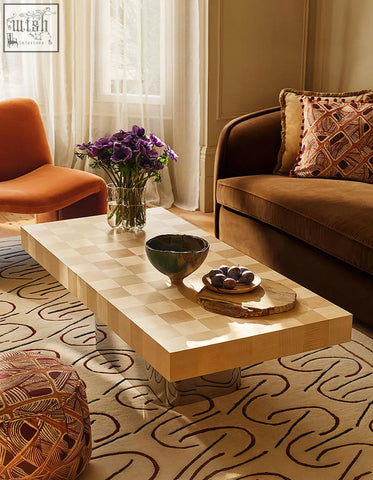 Abrahams rectangle coffee table with a light wood checkered top and sleek metallic legs for modern living