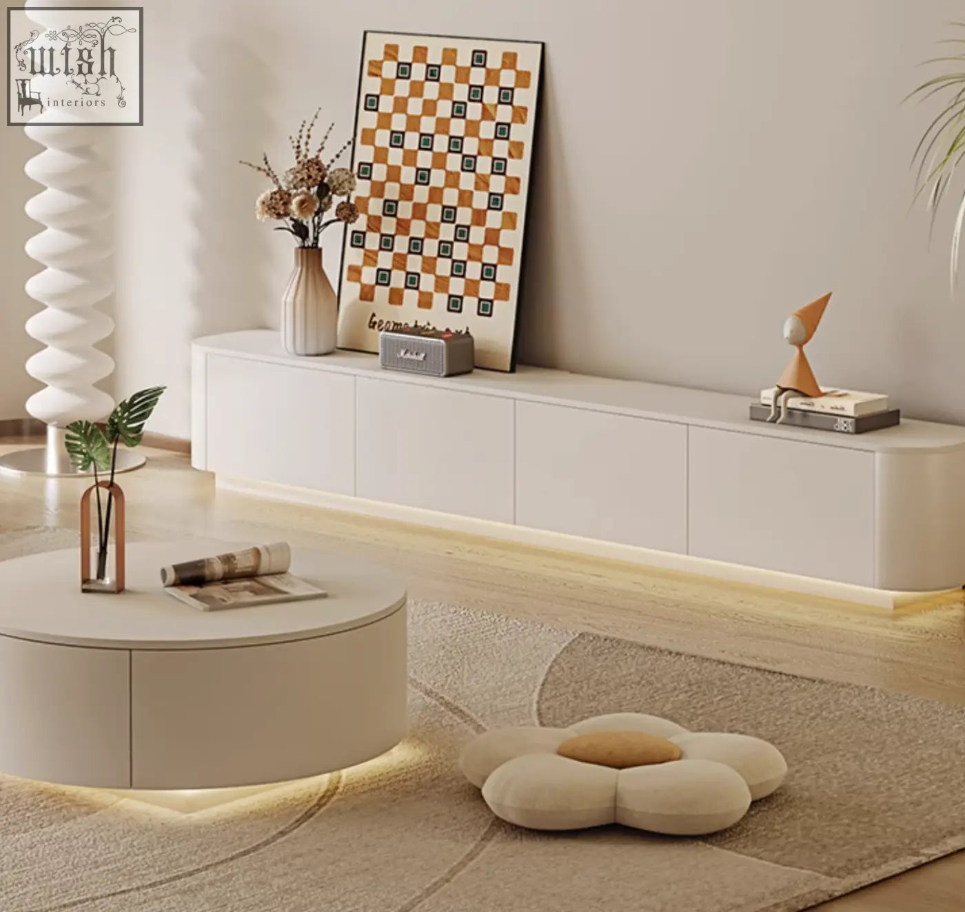 Cream flower-shaped cushion with tan center paired with cream tv stand absinthia with led light and offer financing