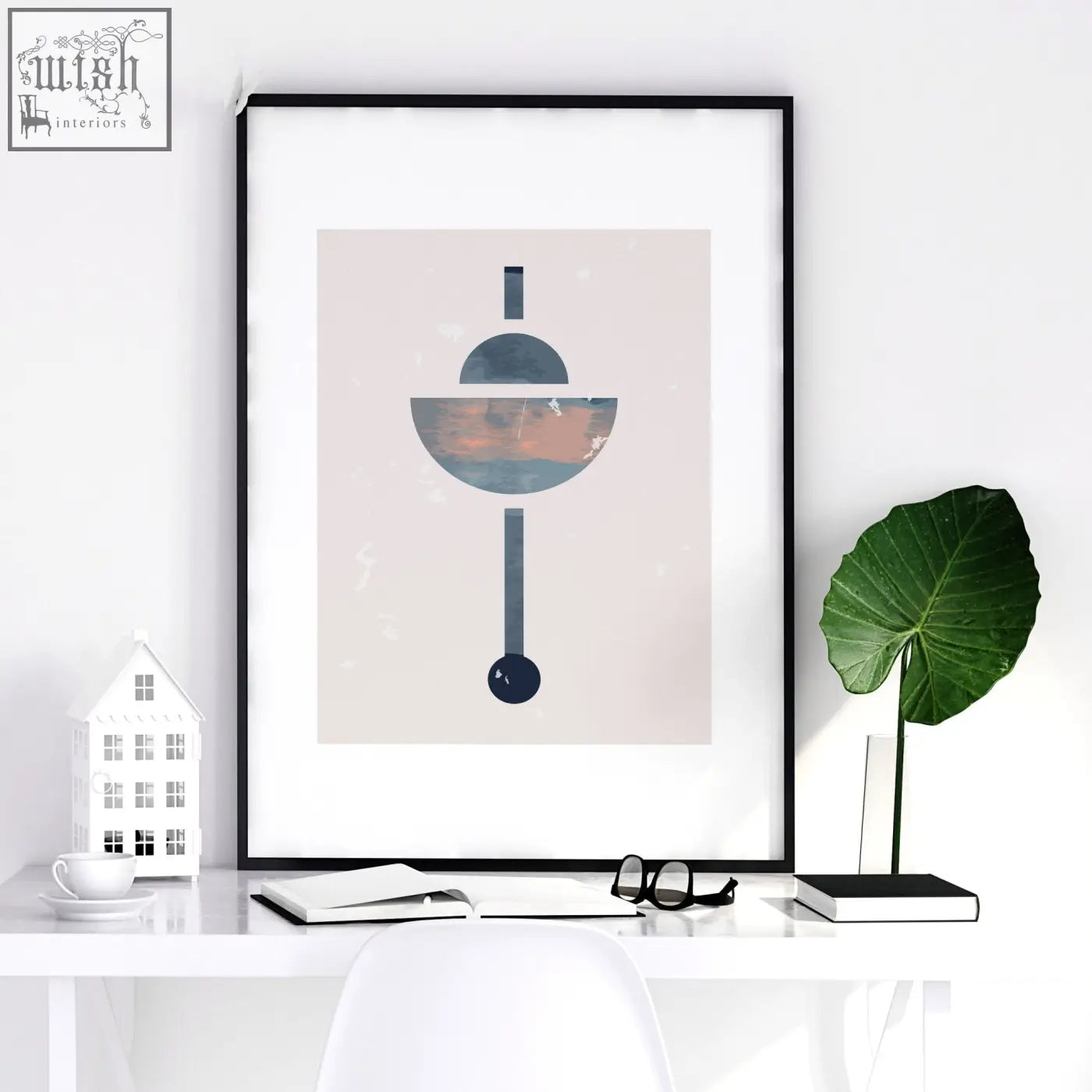 Black-framed abstract art print with geometric shapes in muted gray blue and peach perfect for living room art prints