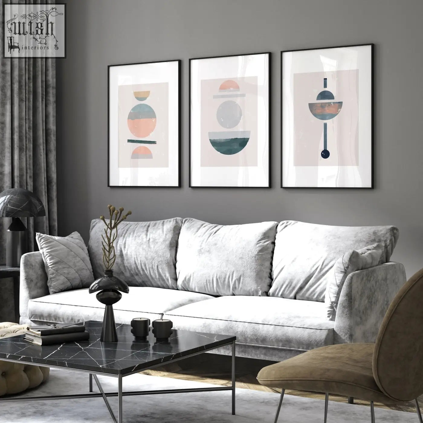 Gray velvet sofa with white cushions in a living room featuring abstract art prints set of 3 framed wall art