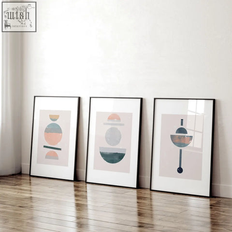 Three framed abstract art prints with pastel and earth-toned geometric shapes perfect for living room decor