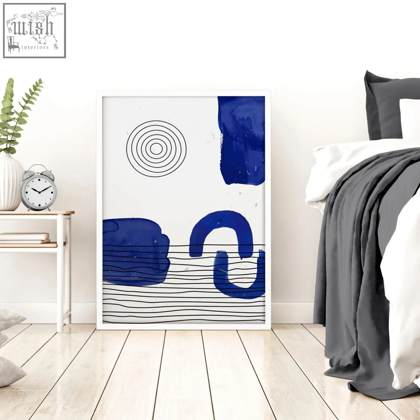 Blue abstract art print with bold brushstrokes and geometric lines in white frame for abstract wall art set