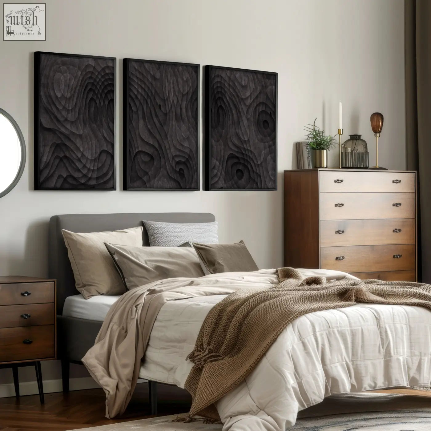Three dark charcoal wood panel abstract artwork with raised topographic wave patterns hanging above bed