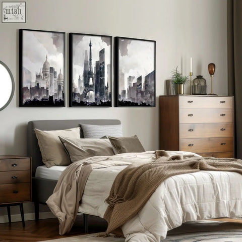 Three black-framed wall art pieces featuring abstract artwork painting of paris city skyline in grey beige tones