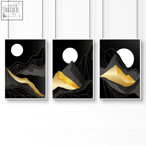 Set of 3 minimalist black and gold mountain landscape wall art prints with white moons in sleek white frames