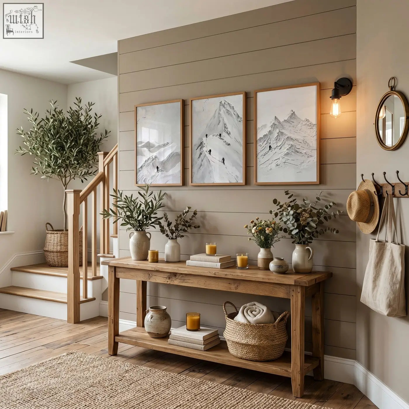 Rustic wooden console table with natural finish and shelves decorated by abstract mountain art white snow climbers wall art prints set of 3