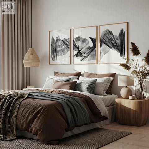 Cozy brown and gray layered bedding with textured knit throw blanket paired with abstract painting art print set of 3