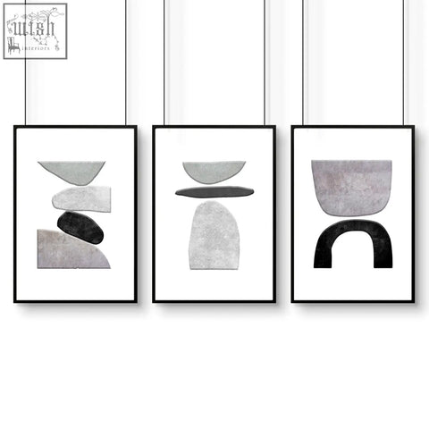 Set of 3 wall art prints featuring minimalist abstract geometric shapes in muted gray and charcoal tones with textured finish