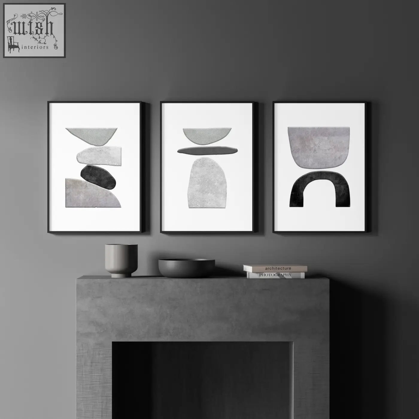 Three minimalist black framed wall art prints with layered geometric shapes in muted gray and charcoal tones on white background