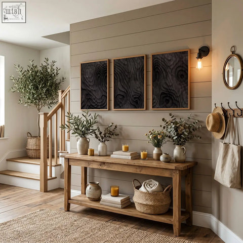 Rustic wooden console table with natural finish shelves decorated with ceramic vases and charcoal topographic wave art prints