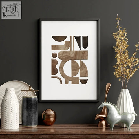 A set of 3 abstract wall art paintings featuring geometric wood shapes in various tones with a sleek black frame