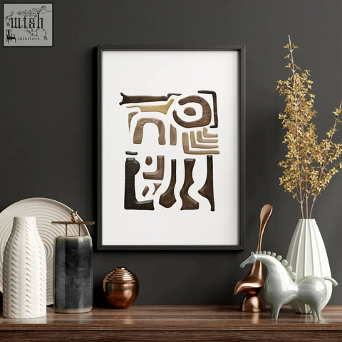 A framed abstract wall art painting with layered wooden cutouts in shades of brown on a white background