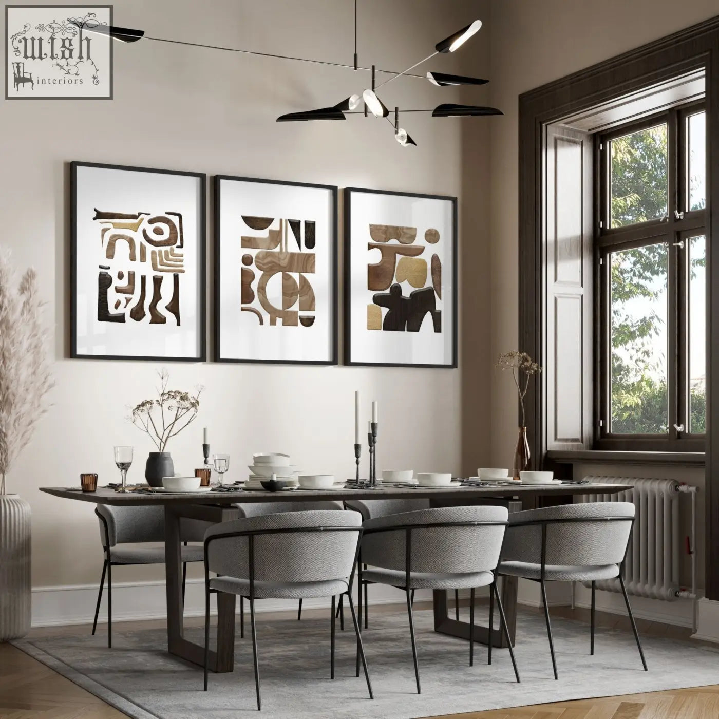 Three framed abstract wall art prints with geometric patterns in earthy brown beige and black above dining table