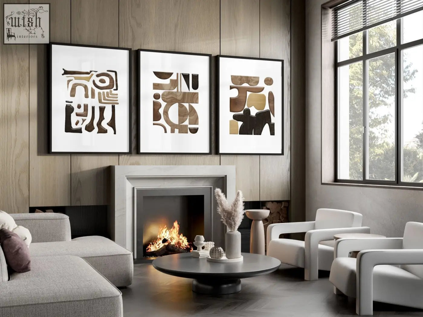 Three framed abstract wall art prints with geometric patterns in earthy brown and black tones above a fireplace