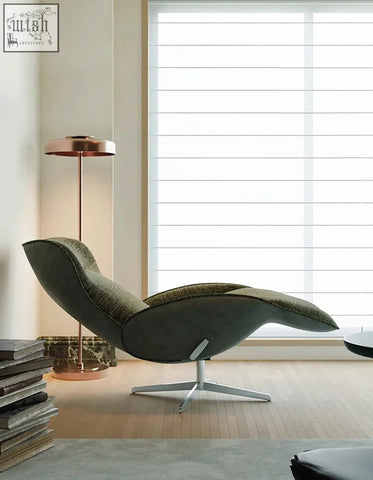 Modern olive-green linen swivel lounge chair with sleek curved design and chrome star base for relaxing comfort