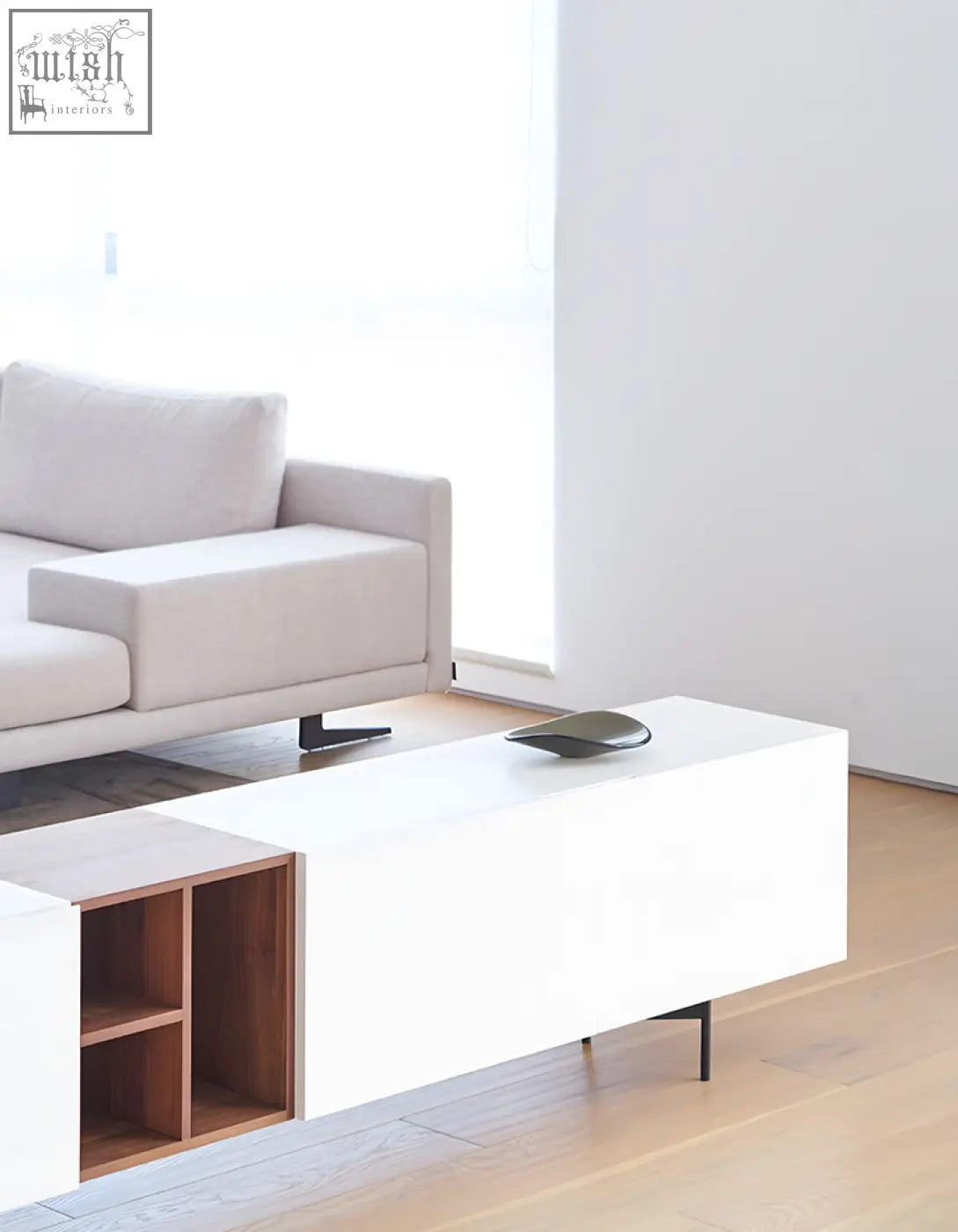 Modern white acacia tv stand with sleek wooden shelving and black legs for organized entertainment space
