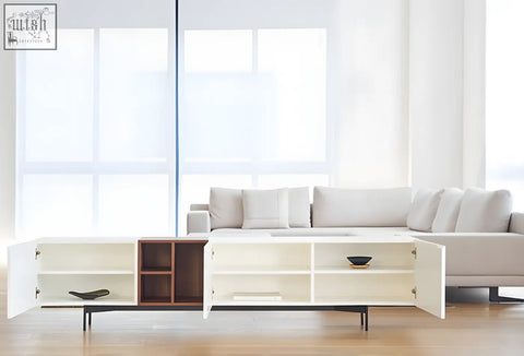 White acacia tv stand with open doors showing shelves and a central dark wood accent cube for organized entertainment
