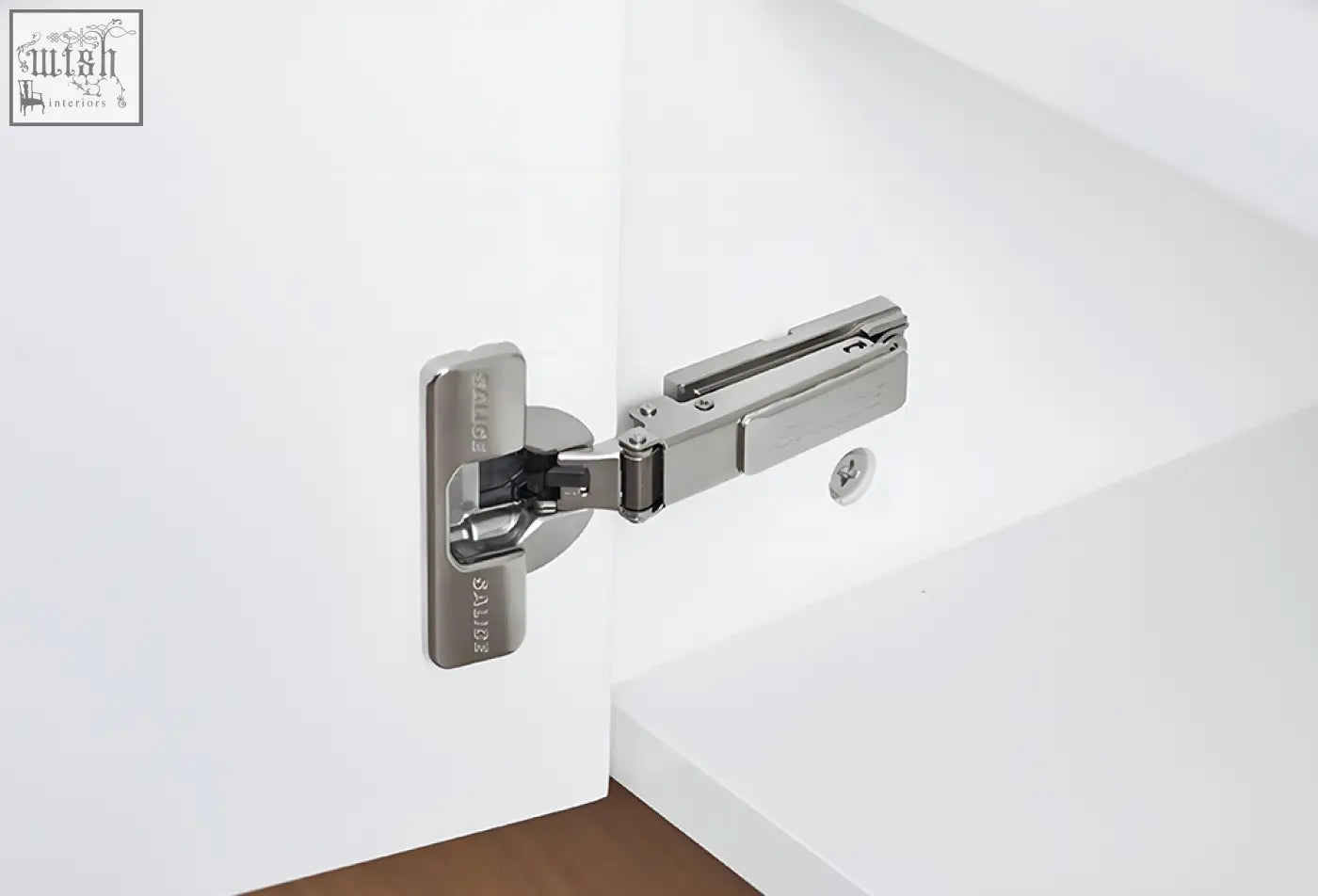 Silver-toned metal hinge on acacia tv stand white for organized entertainment with sleek modern design and visible branding