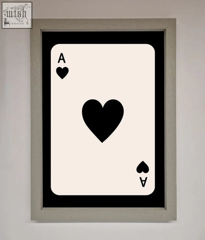A minimalist black and cream ace of hearts framed poster in a sleek gray frame perfect for hearts framed decor