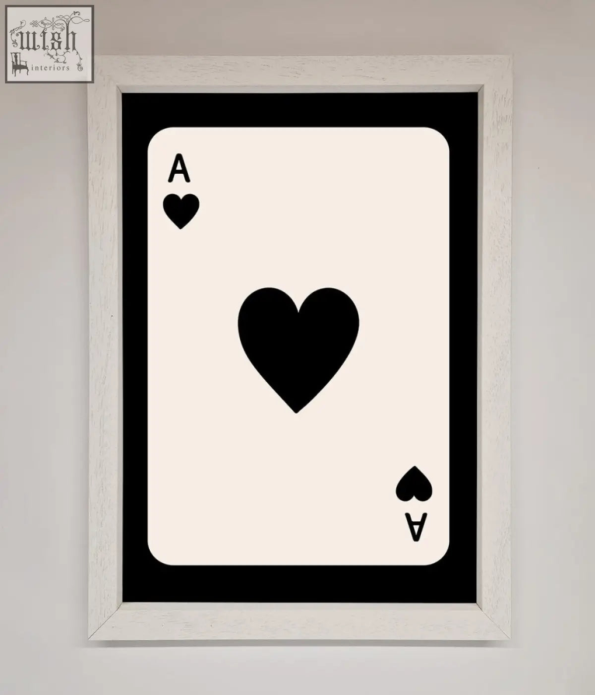 Minimalist ace of hearts framed poster featuring black and cream playing card art in a white frame hearts framed poster