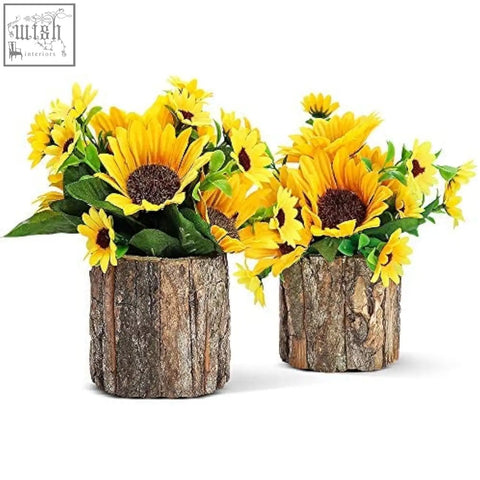Two rustic wooden log vases filled with vibrant yellow aceList artificial sunflowers for indoor decor