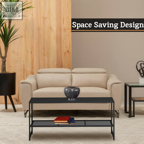 Beige leather sofa with cushioned seating paired with sleek black metal coffee table for modern living rooms