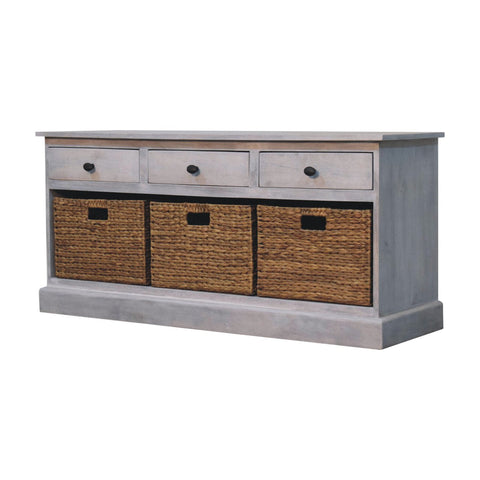 Gray acid wash wooden storage cabinet with three drawers and three woven basket storage compartments below