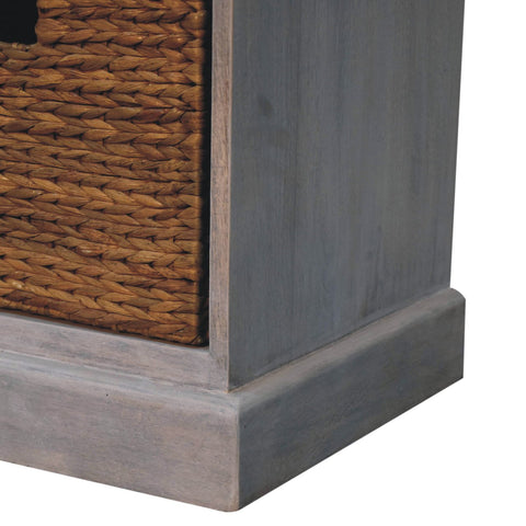 Gray acid wash storage cabinet with woven wicker basket inset for stylish basket storage and organization