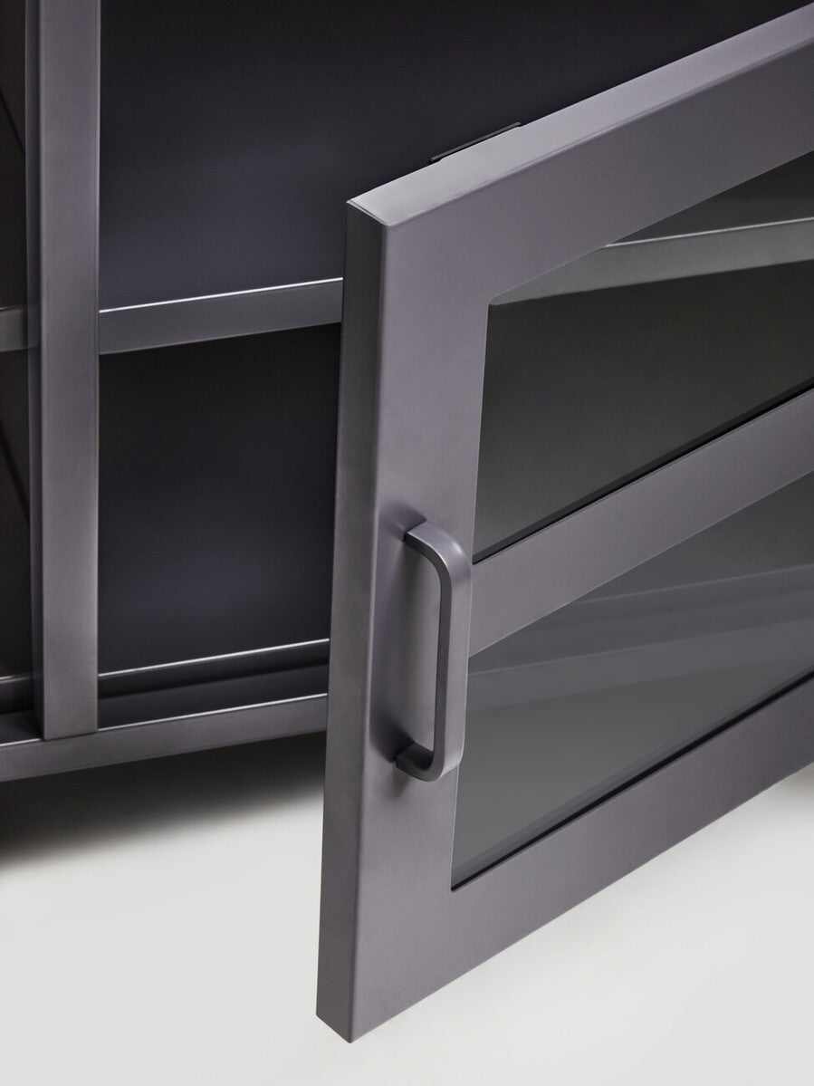 Dark grey metal media unit door with sleek minimalist handle and glass panel in acier two door grey metal media unit