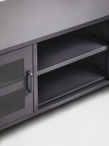 Dark gray metal media unit with glass-paneled door and open shelving for stylish grey metal media storage