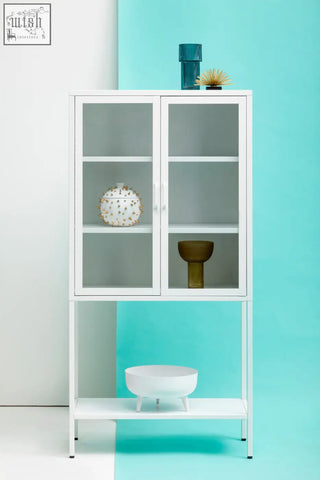 Acier two door white metal cabinet with glass doors featuring a minimalist white metal design and clean lines