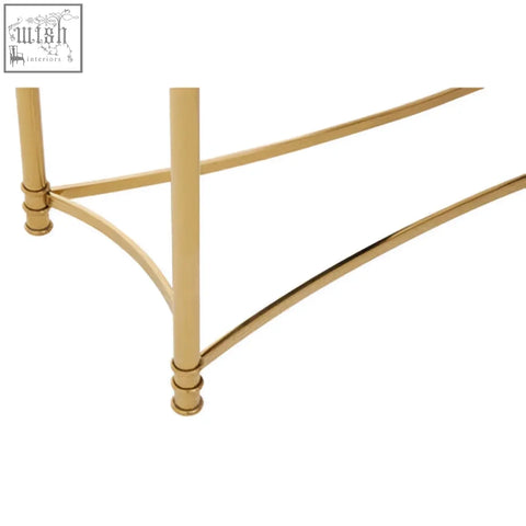 Gold console table ackley gold featuring black glass top and gold-finished metal bed frame with curved legs and decorative joints